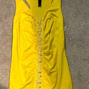 Yellow sleeveless top with pearls
